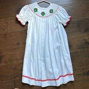 White Christmas dress smocked with green wreaths.  4T
